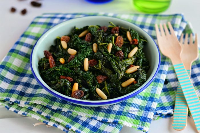 Curly kale with raini and pine nuts
