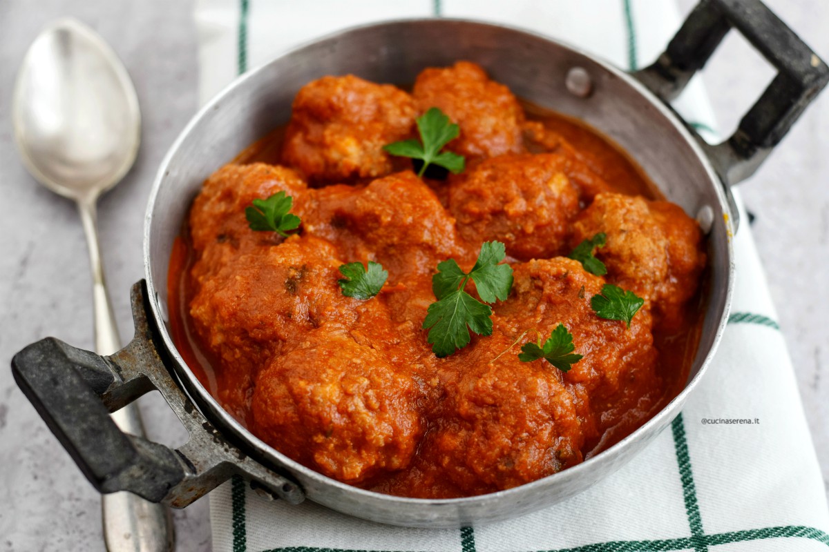 Meat balls recipe in the photo served in a low pot with tomato sauce